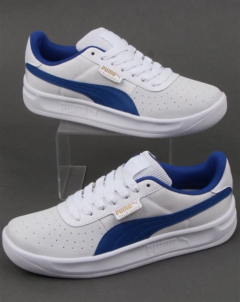 puma blue and white sneakers